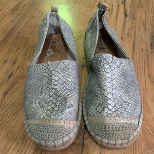 Snakeskin slip ons